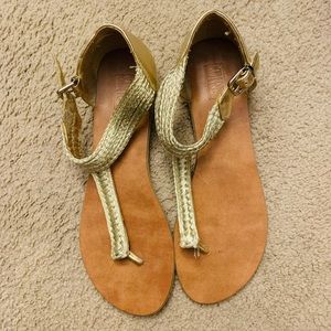 Women’s Mix No. 6 gold T strap sandals in size 11.